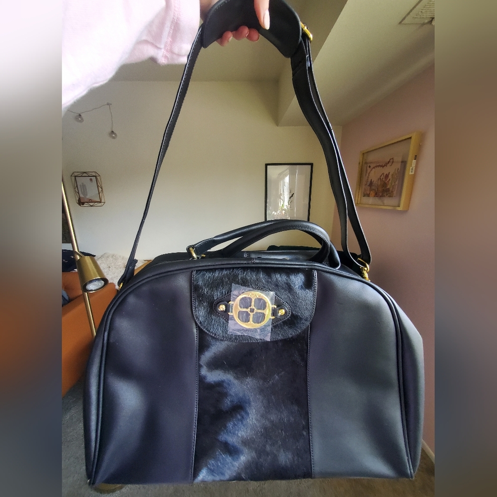 Never used! IMAN 100% split leather carry on tote